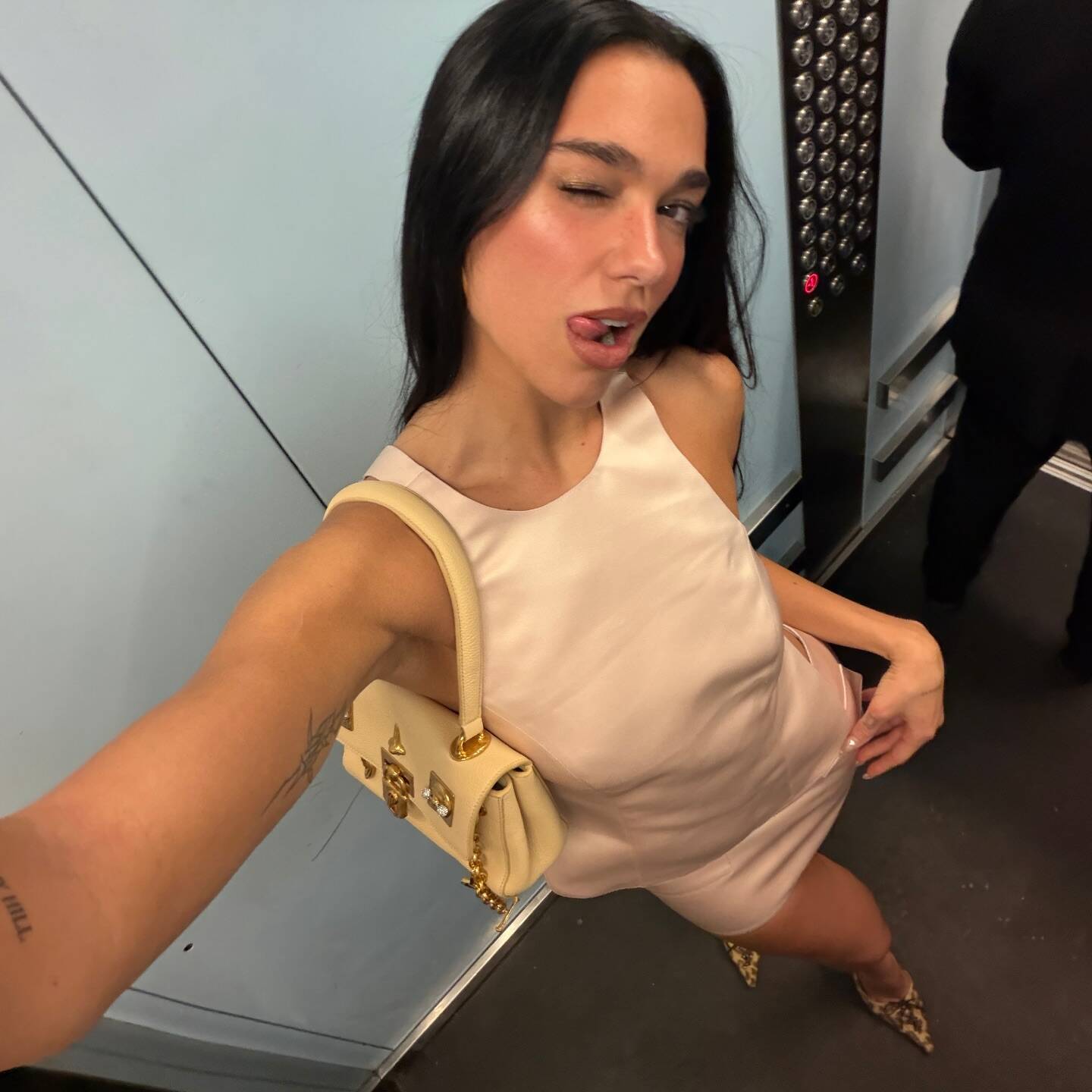 Dua Lipa Stuns in Backless Satin Mini While Sharing Emotional Message on  Instagram