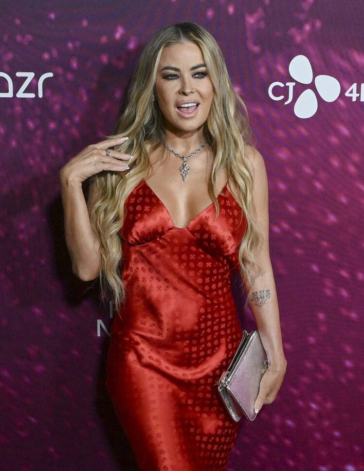 Carmen Electra Flaunts Iconic Curves and New Tattoo in Backless Red Slip  Dress at 'Infinite Icon' Premiere